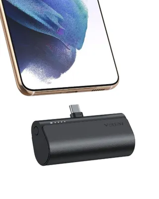 A black power bank with a USB-C connector is shown attached to the bottom of a smartphone.