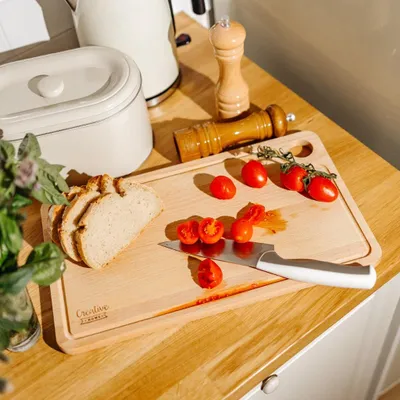 Produktbild von Creative Home Groß Schneidebrett Holz - 42 x 24,5 x 1,5 cm (+- 1 cm) - Holzschneidebrett mit Saftrille