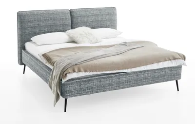 Produktbild von Meise Möbel Polsterbett Infinity 180x200 cm | Doppelbett | Bettgestell | Kopfteil in Kissenoptik | Webstoff Ozeanblau | Metallfuß schwarz