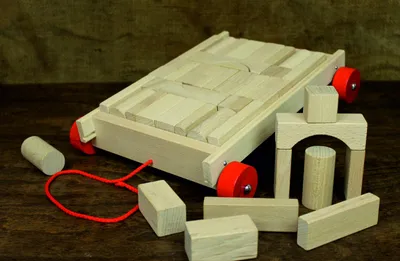 Produktbild von Holzspielzeug Bauwagen mit 36 Bausteinen natur BxHxT 30x25x6cm NEU