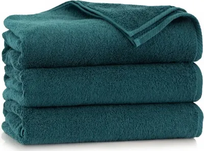 A stack of three folded teal towels.