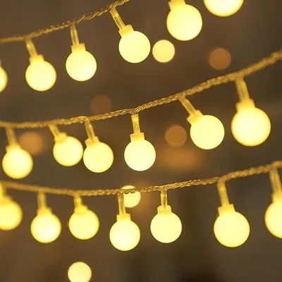 Immagine prodotto di Catena luminosa a LED con 10 luci, lunghezza 1,5 metri, luce bianco caldo, ideale per decorazioni per matrimoni, feste, Natale, balconi e giardini