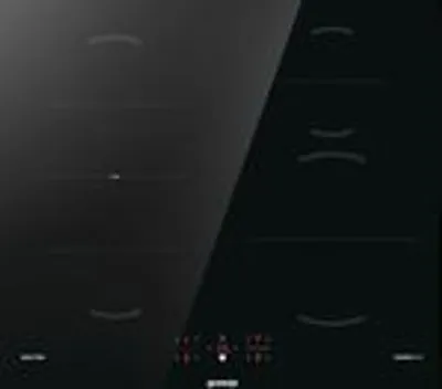 A black induction cooktop with illuminated heating zones.