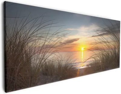 Produktbild von Wallario Premium Leinwandbild Sonnenuntergang am Strand in Größe 50 x 125 cm