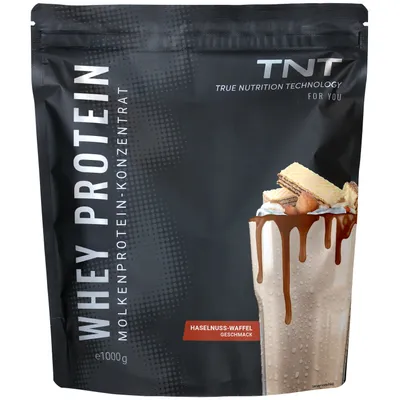 Produktbild von TNT Whey Protein Pulver (1000g) - Haselnuss-Waffel - Molkenprotein-Konzentrat mit Laktase - Leckerer Eiweißshake
