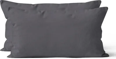 Two dark gray pillowcases are laid out on a white background.