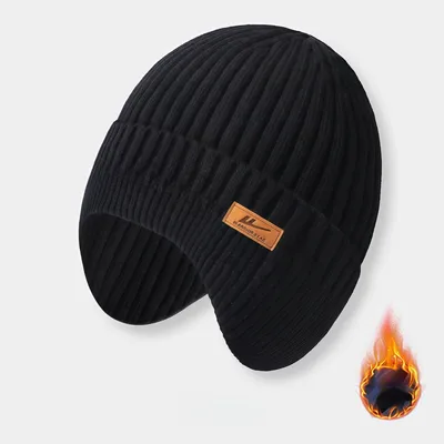 Produktbild von Wintermütze mit Ohrenklappen Uni – Strickmütze mit Fleecefutter, Schwarz