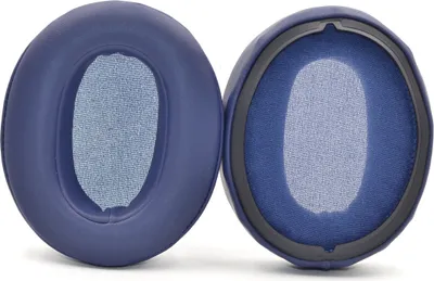 Two blue ear pads for headphones are shown against a white background.