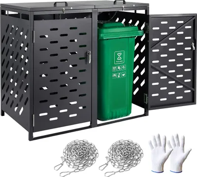 A black metal trash can enclosure with a green trash bin inside, along with two chains and a pair of white gloves.