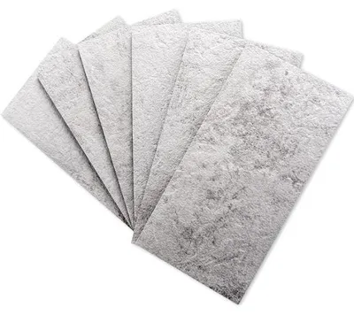 Stack of five rectangular gray filter pads fanned out on a white background