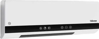 A white Tristar ceramic heater mounted on a wall.