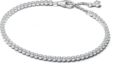 A close-up studio shot of a silver tennis bracelet with clear cubic zirconia stones.