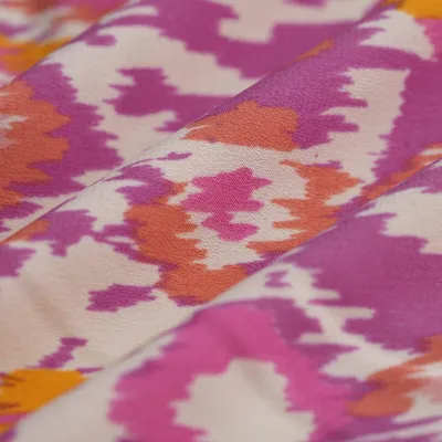 Productafbeelding van Satijnstof, polyester, ikat, roze-oranje