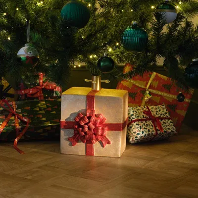 Imagen del producto de Soporte para el árbol de Navidad como regalo, con lazo