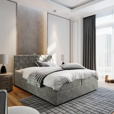 A bedroom scene with a bed as the main focus.