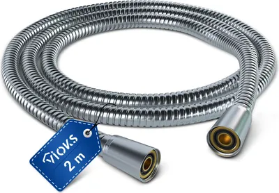 A coiled silver shower hose with metal connectors on a white background.