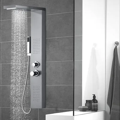 A modern shower panel system in a bathroom.