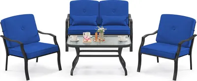 A patio furniture set with a loveseat, two chairs, and a coffee table, all with blue cushions, displayed on a white background.