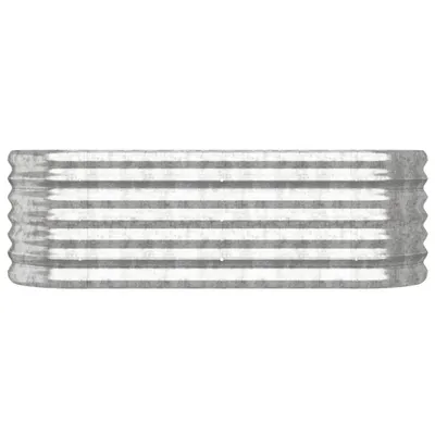 A close-up, side view of a corrugated metal object with horizontal ridges.