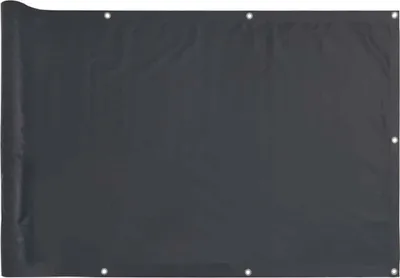 A dark gray balcony privacy screen is laid out flat, showing its grommets along the top and bottom edges.
