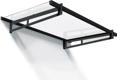 A modern black and clear awning mounted on a white wall, casting a shadow.
