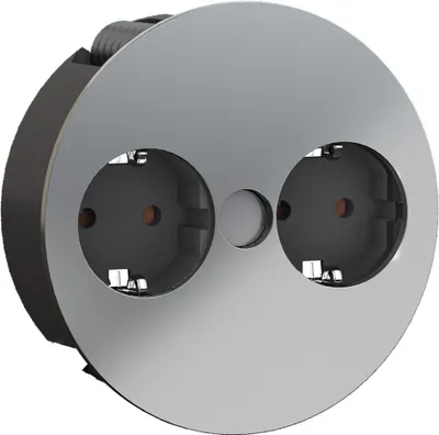 A close-up, studio shot of a double electrical outlet with a chrome-plated faceplate.