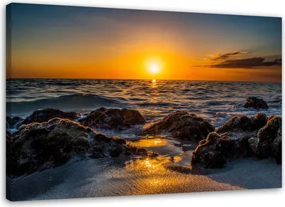 Produktbild von Leinwandbild steiniger strand sonnenuntergang 100x70 cm Feeby gelb wandbild bereit zum aufhängen