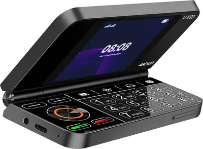 A black flip phone with its screen open, displaying the time.
