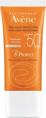 A product shot of an orange and white tube of sunscreen.