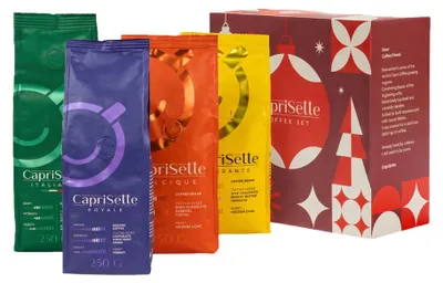 Produktbild von Kaffeebohnen-Set Caprisette, 4 x 250 g, in einer weihnachtlichen Geschenkverpackung