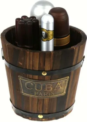 A wooden bucket filled with various items, including what appears to be cologne bottles and other gift items.