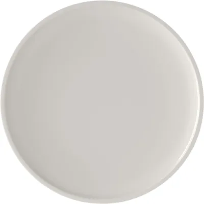 A plain white plate on a white background.