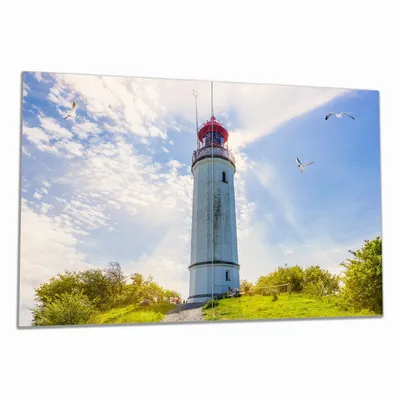 Produktbild von Wallario Herdabdeckplatte aus Glas, Größe 80 x 52 cm 2-teilig, Motiv Leuchtturm auf Hiddensee bei Sonnenschein