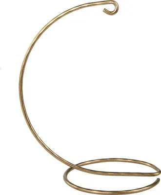 A gold-colored metal stand for hanging ornaments.