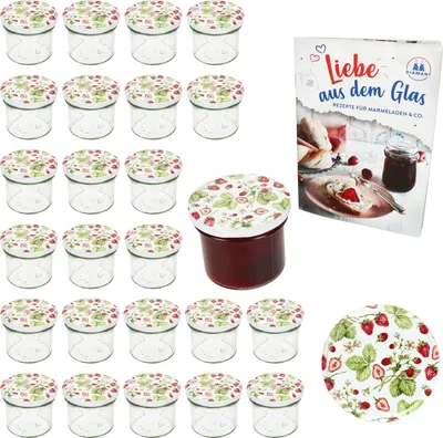 A collection of small glass jars with strawberry-themed lids, a jar filled with jam, and a recipe book.