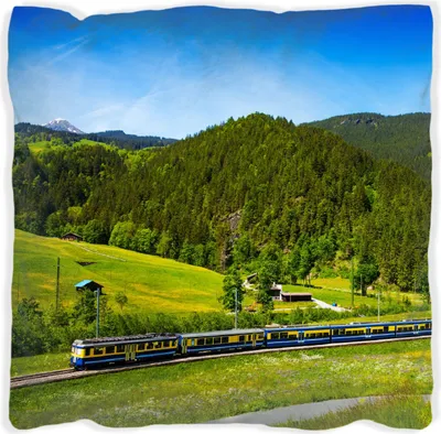 Produktbild von Wallario Premium Kissen, weiche Oberfläche, mit Motiv Eisenbahn in einer Sommerlandschaft in der Schweiz, Größe: 60 x 60 cm, mit weißer Rückseite