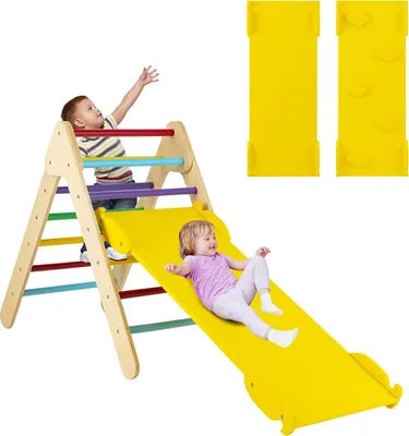 Two children playing on a wooden climbing triangle with a yellow slide.