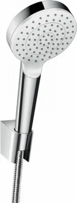 A chrome and white hand-held shower head mounted on a wall bracket, with a flexible hose attached.
