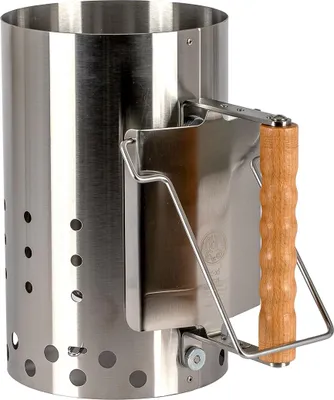 A stainless steel charcoal chimney starter with a wooden handle.