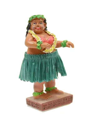 A figurine of a hula dancer.