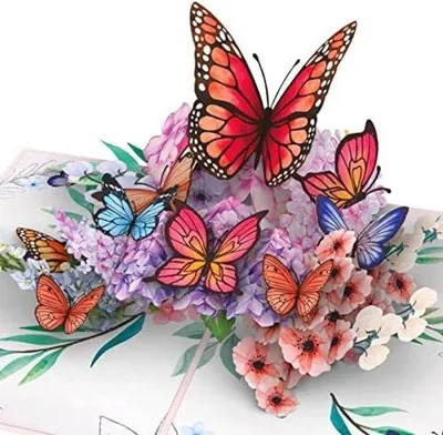 Immagine prodotto di Biglietto d'auguri rosa con farfalle e motivi floreali, comprensivo di un biglietto personalizzabile.