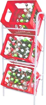 A three-tiered stand holding red Coca-Cola crates filled with bottles.