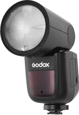 A black Godox V1S camera flash with a round head is shown against a white background.