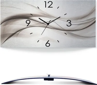 A wall clock with an abstract wave design and a separate image of the clock's curved profile.