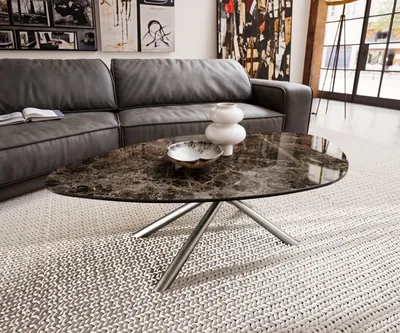 Produktbild von DELIFE Couchtisch Edge Organisch 140x76 cm Keramik Emperador Extra Lucidato Dunkelbraun Sarity Edelstahl gebürstet