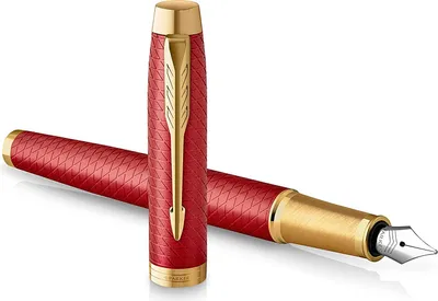 A red and gold fountain pen with its cap off, lying on a white background.