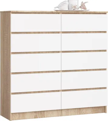 A chest of drawers with white drawers and a wood-grain frame, shown from the front.