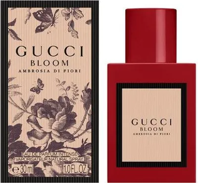 A product shot of a Gucci Bloom Ambrosia di Fiori perfume bottle and its packaging.