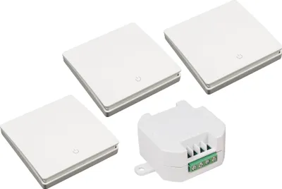 A product shot of a wireless switch set including a receiver and three wall buttons, displayed on a white background.