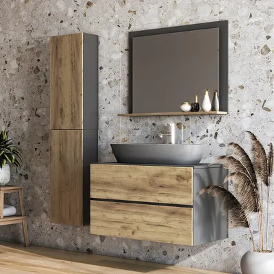 A modern bathroom vanity with a sink and mirror, featuring wood and gray finishes, set against a textured tile wall.